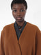 ‘Maselli’ long length belted wrap coat in burnt orange virgin wool