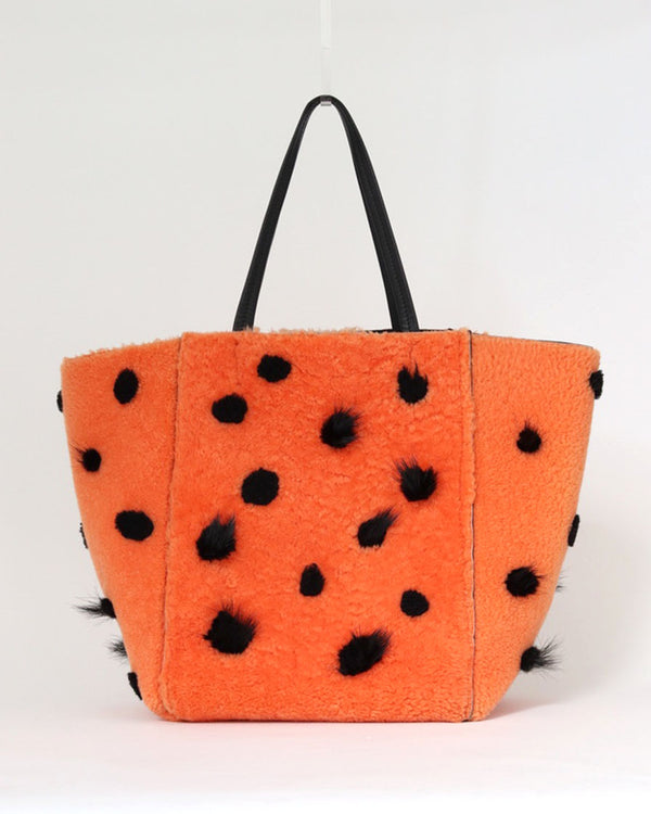 'Phantom Cabas' tote bag in reversible orange shearling and black leather