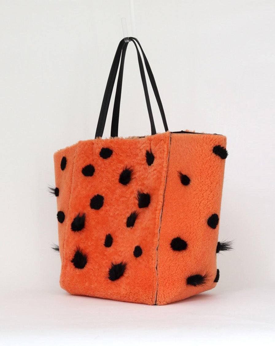 'Phantom Cabas' tote bag in reversible orange shearling and black leather