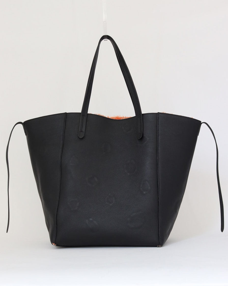 'Phantom Cabas' tote bag in reversible orange shearling and black leather