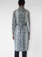 BELTED RAINCOAT IN SNAKE PRINT COATED COTTON