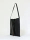 Minimal shoulder bag in black leather