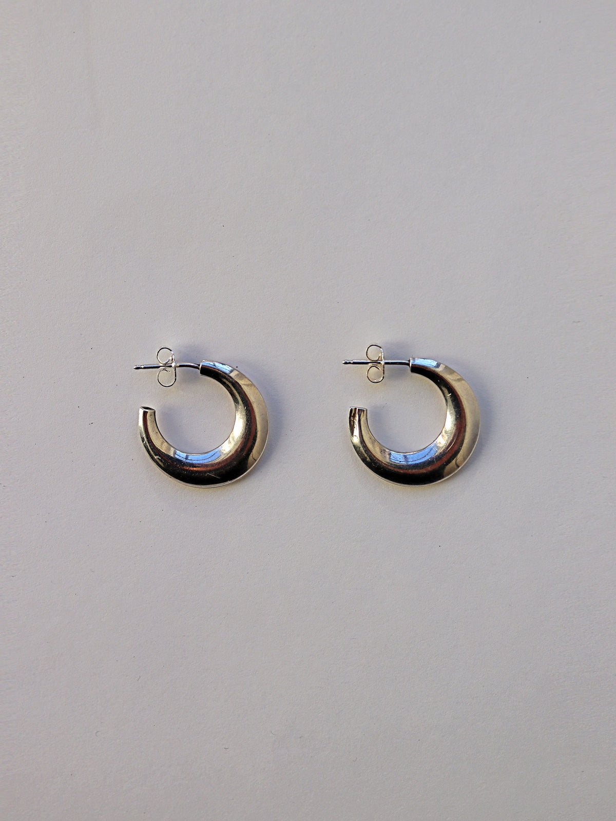 CRESCENT HOOP EARRING IN STERLING SILVER