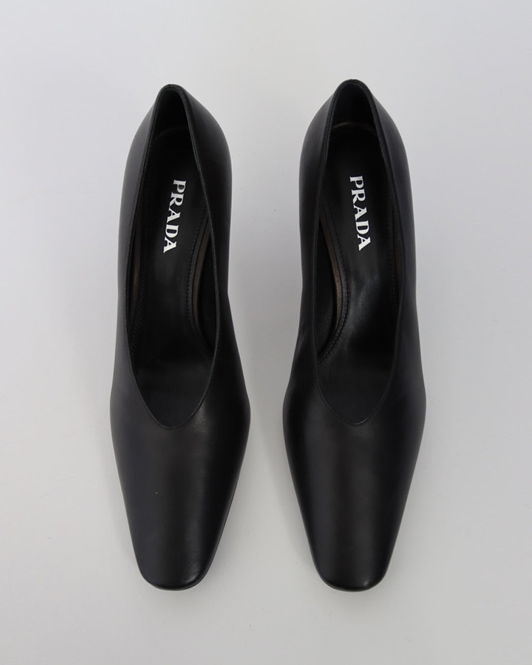 ALMOND TOE GRAPHIC HEEL PUMPS IN BLACK LEATHER