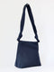 ‘Wander’ knot crossbody bag in navy blue silk