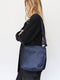 ‘Wander’ knot crossbody bag in navy blue silk